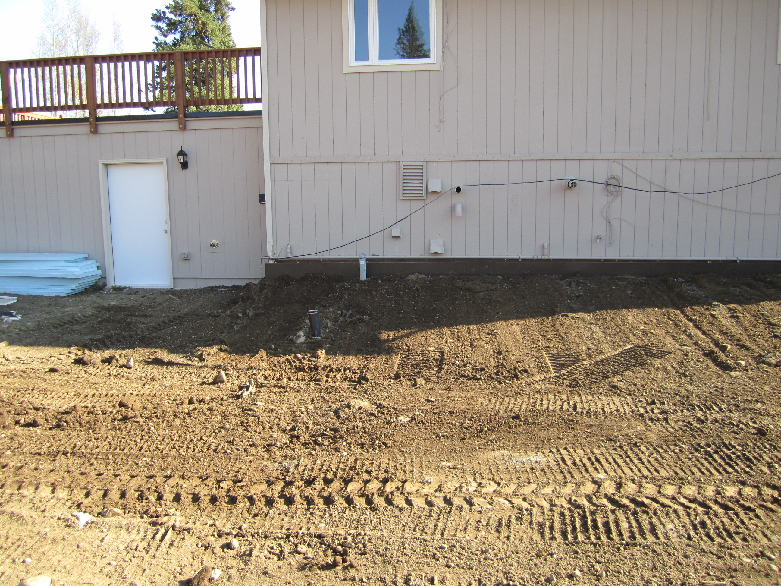 House site graded, compacted and ready for pavement.